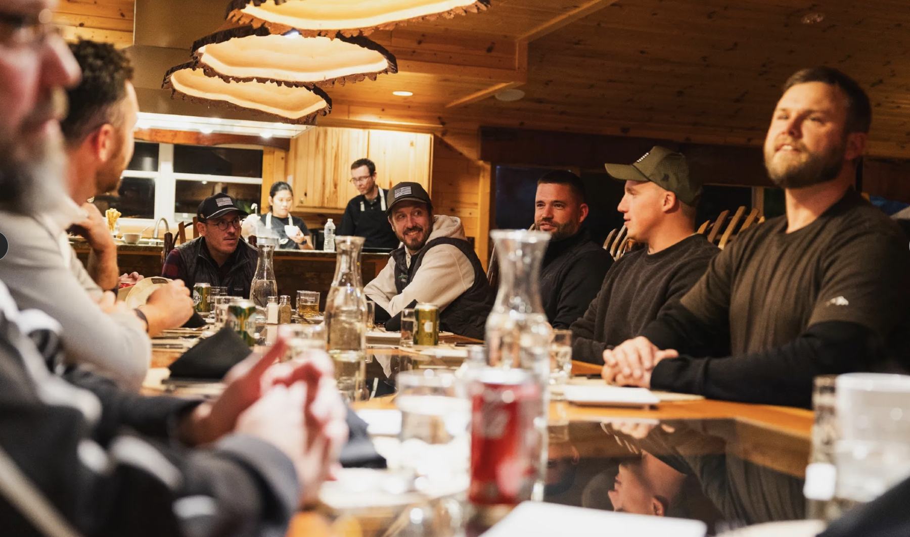 Roofday members around a retreat dinner table